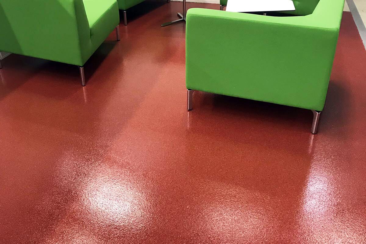 Red industrial floor coating with highly durable seal coat